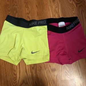yellow & pink nike pros